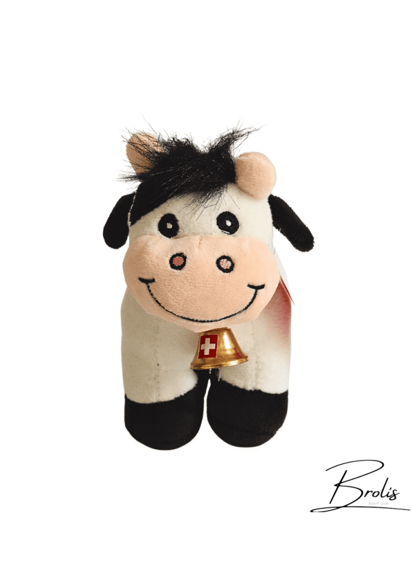 Peluche vache suisse avec cloche dorée et drapeau suisse